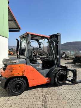 Used Forklift Truck TOYOTA 40-8FD35N DIESEL VIERRADFRONTSTAPLER (13050552) backdrop