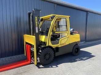 Carretilla elevadora segunda mano HYSTER H5.5FT GAS VIERRADFRONTSTAPLER (13049703) backdrop