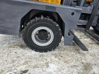 Chariot élévateur d'occasion BAUMANN GX70/14/57TR - TRIPLEX DIESEL SEITENSTAPLER (12972339)