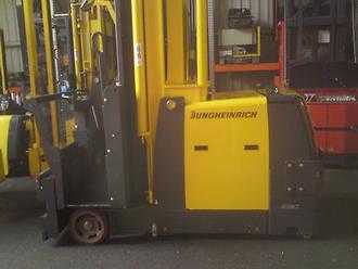 Chariot élévateur d'occasion JUNGHEINRICH EKX513 / Mastschwenkgabel / ILF ELEKTRO HOCHREGALKOMMISSIONIERER (12196174) backdrop