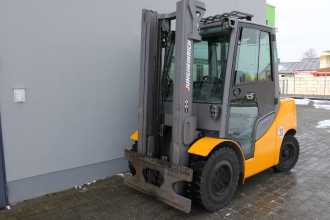 Chariot élévateur d'occasion JUNGHEINRICH TFG 550s G180-350ZT GAS VIERRADFRONTSTAPLER (12998935) backdrop