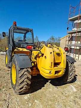 Gabelstapler gebraucht KOMATSU WH609-613-713 DIESEL TELESKOPARMSTAPLER (12958965)