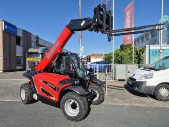 Gabelstapler gebraucht MANITOU ULM 412 H Comfort DIESEL TELESKOPARMSTAPLER (13070806) backdrop