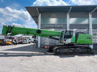 Gabelstapler gebraucht SENNEBOGEN 673e / 4.093h / 2018 / Klappspitze / 44m DIESEL TELESKOPARMSTAPLER (13052333) backdrop