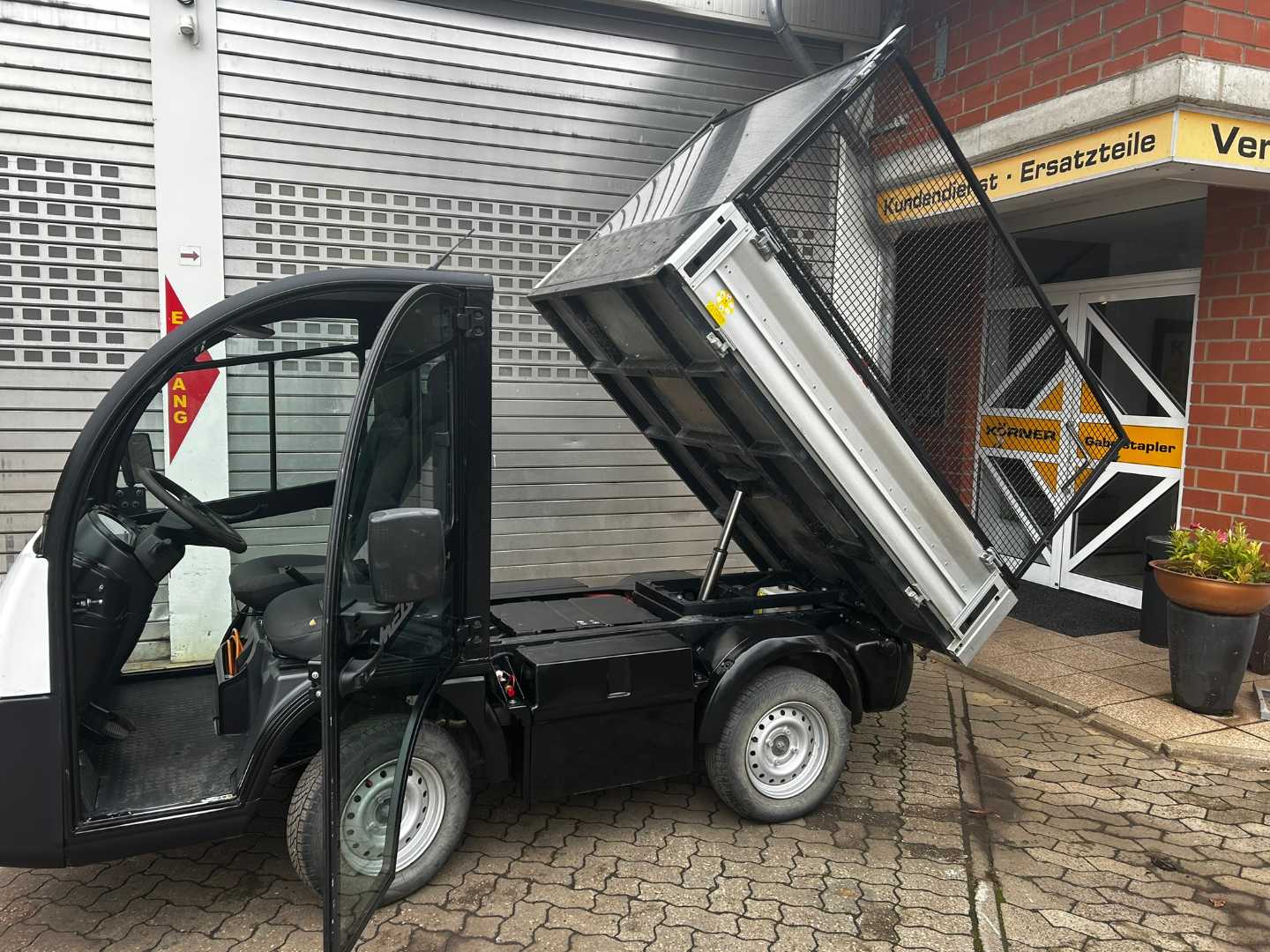 Használt targonca MEGA E-Worker Kipper ELEKTRO FAHRERSITZWAGEN (12936058)