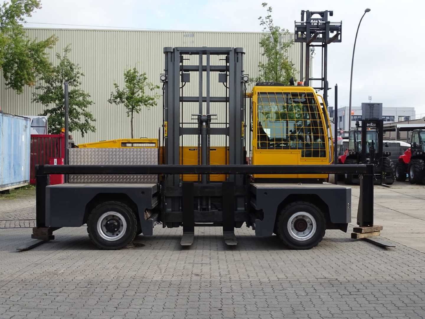 Heftruck gebruikt BAUMANN EGX50/14/75TR - TRAVERSE ELEKTRO SEITENSTAPLER (13063742)