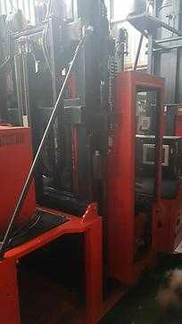 Heftruck gebruikt MAGAZINER EK1200 TK-Kabine -30 Grad / Mastschwenkgabel / MLF ELEKTRO HOCHREGALKOMMISSIONIERER (2574053) backdrop