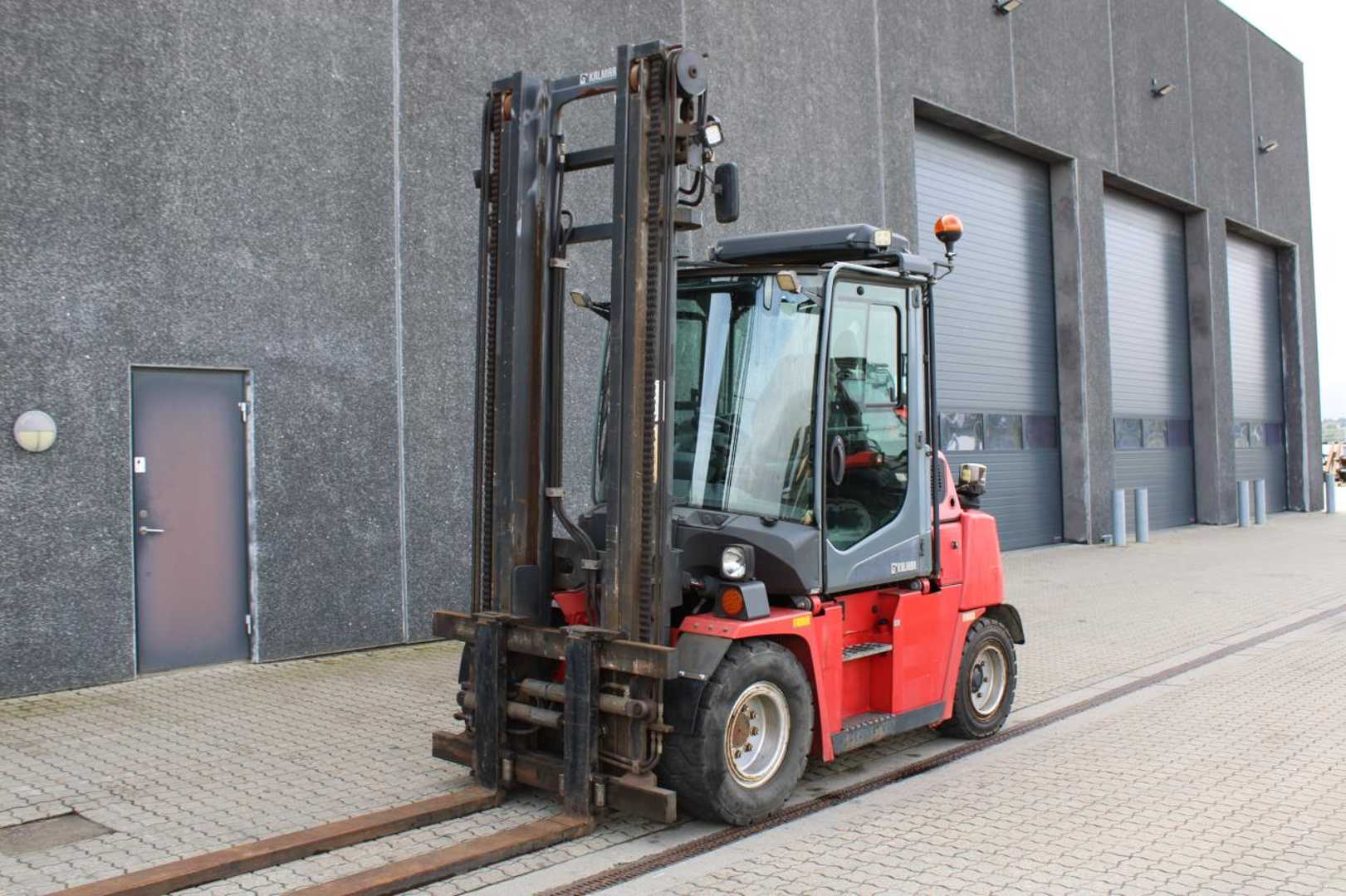 Used Forklift Kalmar DCG55-6H 4 ratų šakinis krautuvas (Image 2) Used Forklift Kalmar DCG55-6H 4 ratų šakinis krautuvas (Image 2)