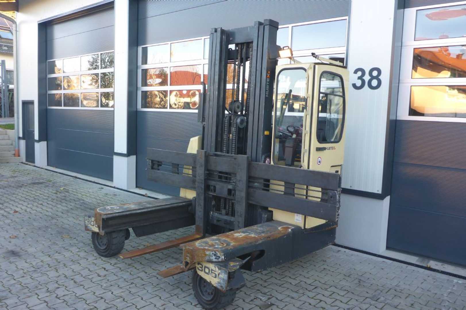 Used Forklift Hubtex DQ40-G Keturių krypčių krautuvas (Image 1)