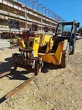 Muletto usato KOMATSU WH609-613-713 DIESEL TELESKOPARMSTAPLER (12958965) backdrop