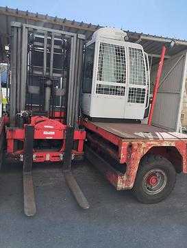 Použité vysokozdvižné vozíky BAUMANN DFQ50 16 57 DIESEL SEITENSTAPLER (13036772)