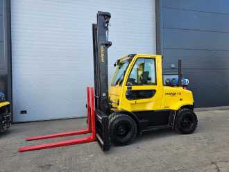 Použité vysokozdvižné vozíky HYSTER H7.0FT GAS VIERRADFRONTSTAPLER (12948574) backdrop