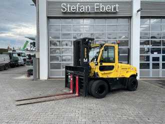 Used Forklift Truck HYSTER 5,52m / ZVG DIESEL VIERRADFRONTSTAPLER (13063844) backdrop