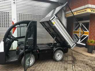 Used Forklift Truck MEGA E-Worker Kipper ELEKTRO FAHRERSITZWAGEN (12936058) backdrop