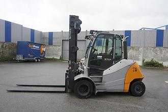 Used Forklift Truck STILL RX 70-80 - Triplex DIESEL VIERRADFRONTSTAPLER (13011326) backdrop