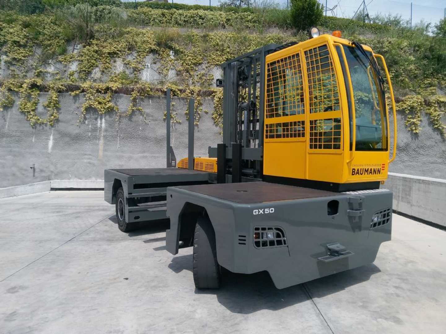 Wózki widłowe używane BAUMANN GX 60/14/63 TR DIESEL SEITENSTAPLER (13048977)