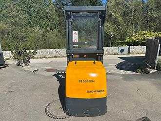 Wózki widłowe używane JUNGHEINRICH EKS 110 - 280ZZ ELEKTRO MITTELHUBKOMMISSIONIERER (13068410)