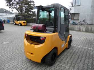 Wózki widłowe używane JUNGHEINRICH TFG S50s - Kabine mit Heizung - 4. Funktion GAS VIERRADFRONTSTAPLER (13009650)