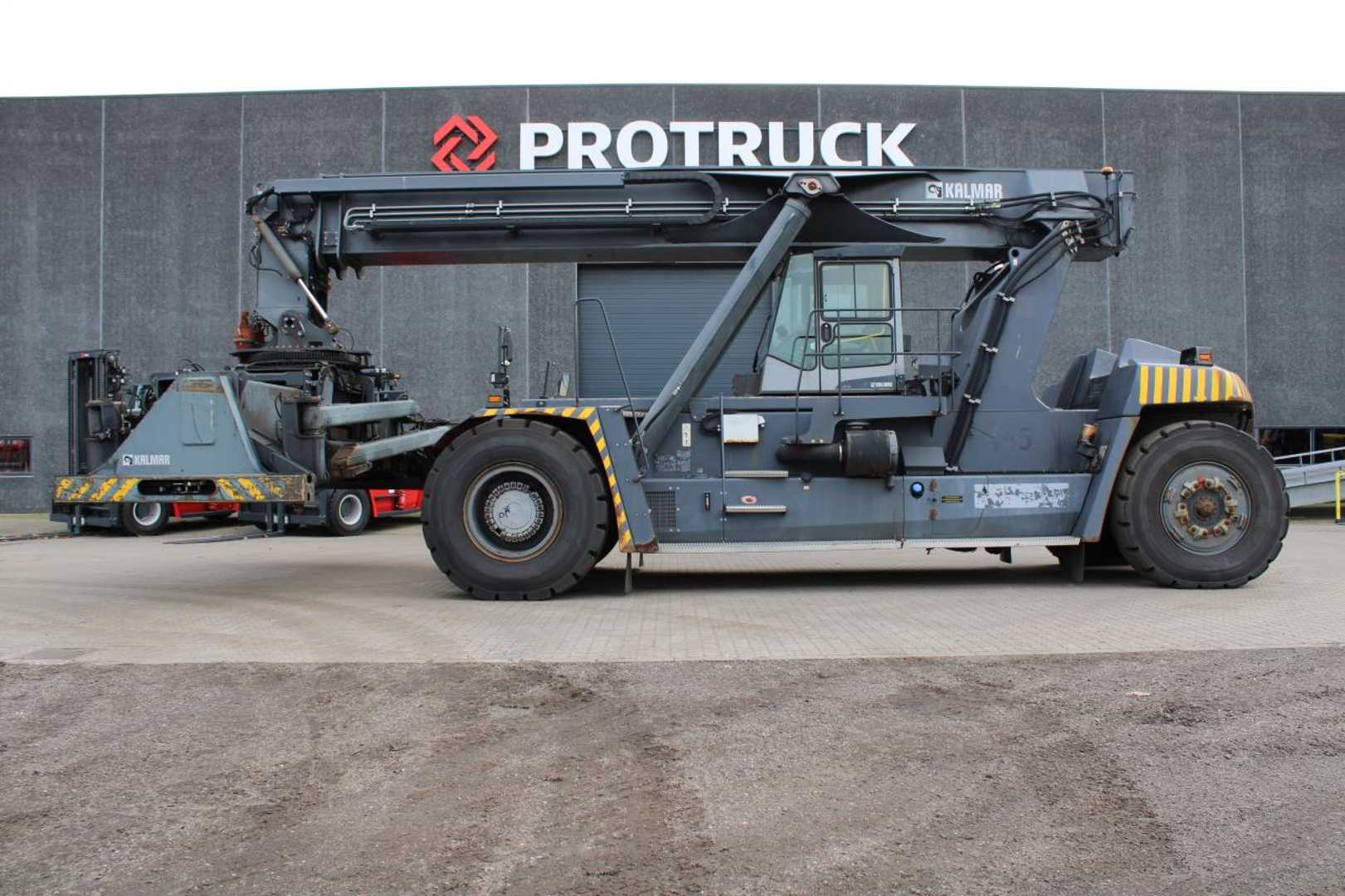 Wózki widłowe używane KALMAR 70C5X DIESEL REACHSTACKER (12997850)