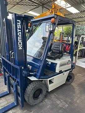 Wózki widłowe używane KOMATSU FG14 GAS VIERRADFRONTSTAPLER (12994977)