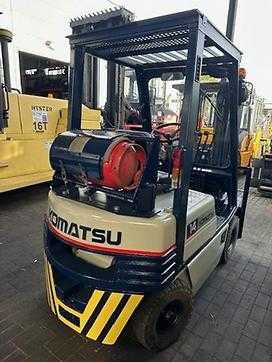 Wózki widłowe używane KOMATSU FG14 GAS VIERRADFRONTSTAPLER (12994977)