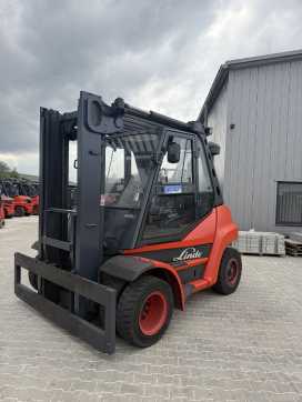 Wózki widłowe używane LINDE H80D-02 DIESEL VIERRADFRONTSTAPLER (13066511) backdrop