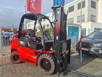 Wózki widłowe używane MANITOU MI 35 Gas Triplex GAS VIERRADFRONTSTAPLER (12998638) backdrop