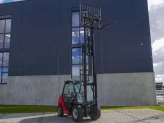 Wózki widłowe używane MANITOU MSI 35D ST5 S1 DIESEL GELAENDESTAPLER (12654394) backdrop
