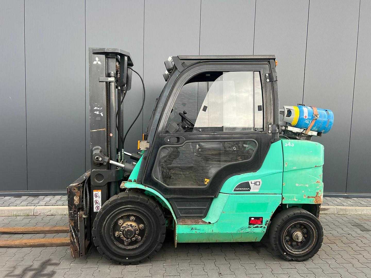 Wózki widłowe używane MITSUBISHI FG40NT GAS VIERRADFRONTSTAPLER (13065256)