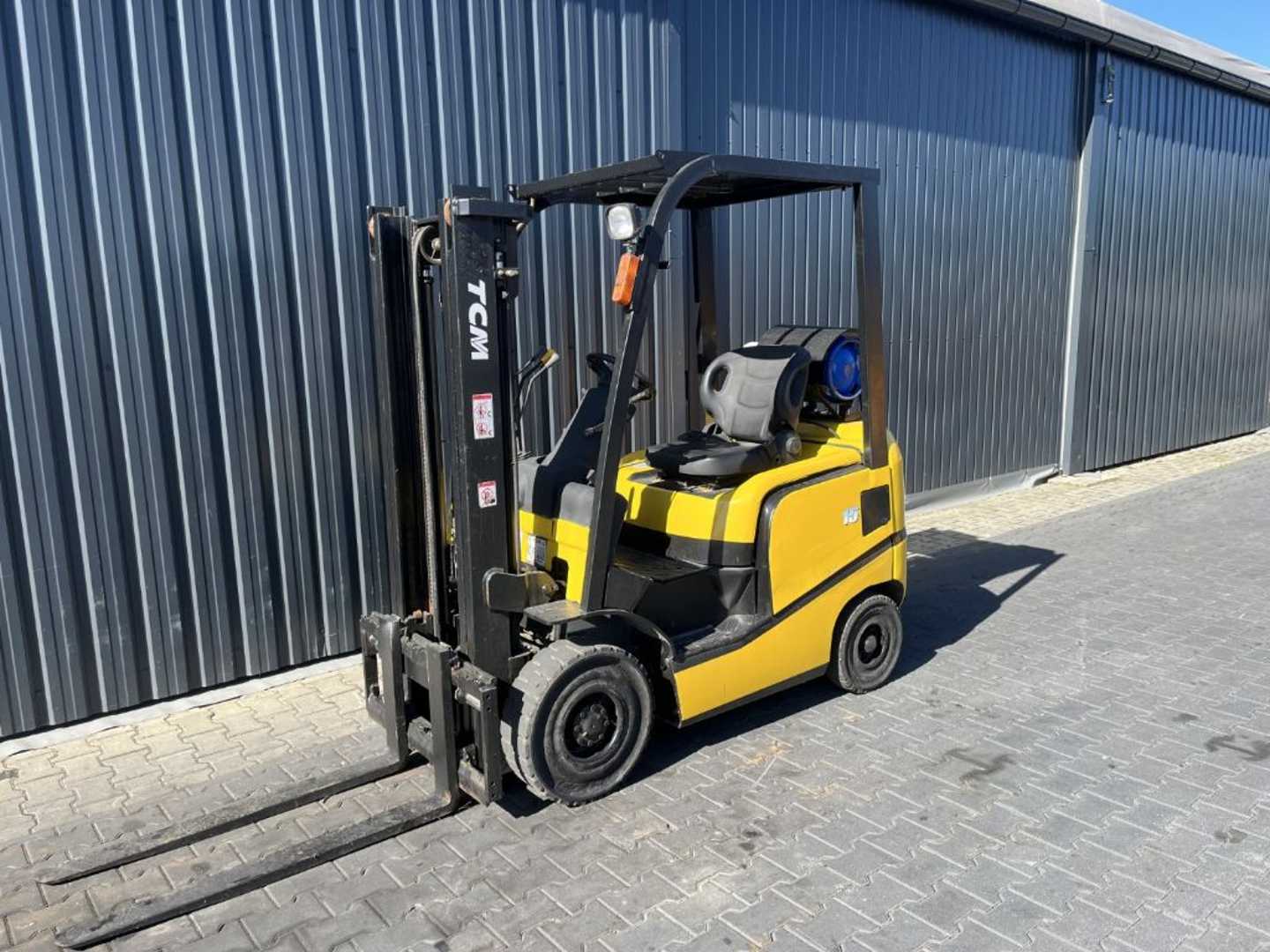 Wózki widłowe używane TCM FG15T13 GAS VIERRADFRONTSTAPLER (13049430)